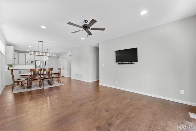 14 Ivyleigh Ct, Saint Charles, MO 63303 - living room with a ceiling fan, dark wood-type flooring, and recessed lighting