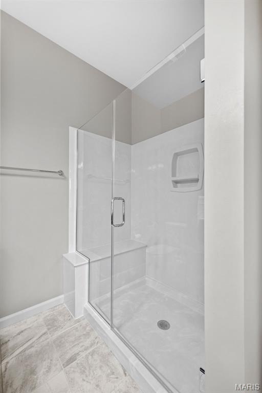 14 Ivyleigh Ct, Saint Charles, MO 63303 - full bathroom with a shower stall and baseboards