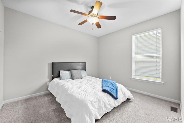 14 Ivyleigh Ct, Saint Charles, MO 63303 - carpeted bedroom featuring baseboards and a ceiling fan