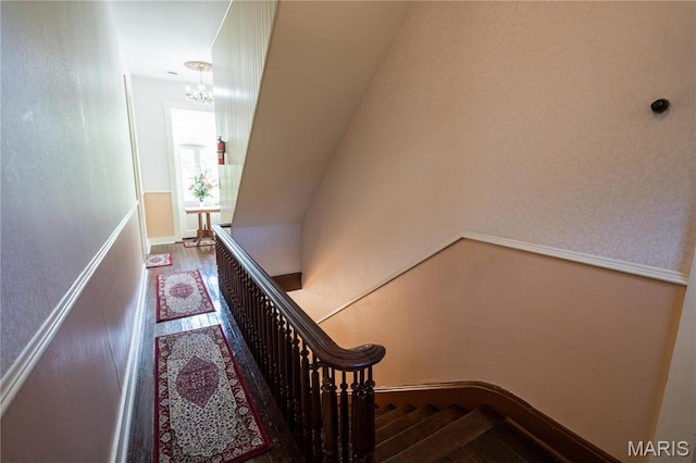 415 E 1st St, Hermann, MO 65041 - staircase with a chandelier and wood finished floors