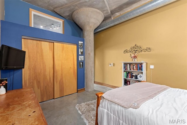 2323 Locust St Unit 308, Saint Louis, MO 63103 - bedroom featuring concrete flooring and a closet