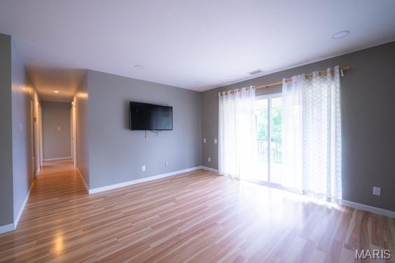 9145 Villaridge Ct H, Unit H, MO 63123 - empty room with baseboards and wood finished floors