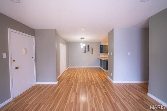 9145 Villaridge Ct H, Unit H, MO 63123 - unfurnished living room with light wood finished floors
