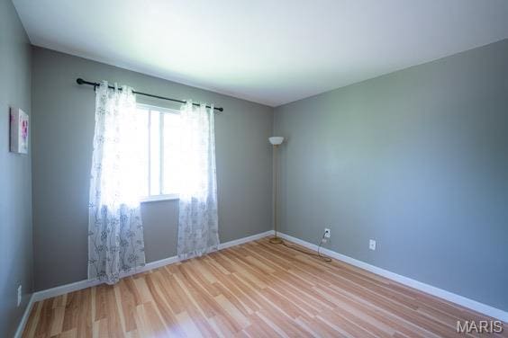 9145 Villaridge Ct H, Unit H, MO 63123 - empty room with wood finished floors and baseboards