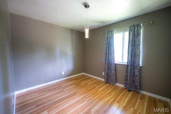9145 Villaridge Ct H, Unit H, MO 63123 - spare room with light wood-style flooring and baseboards