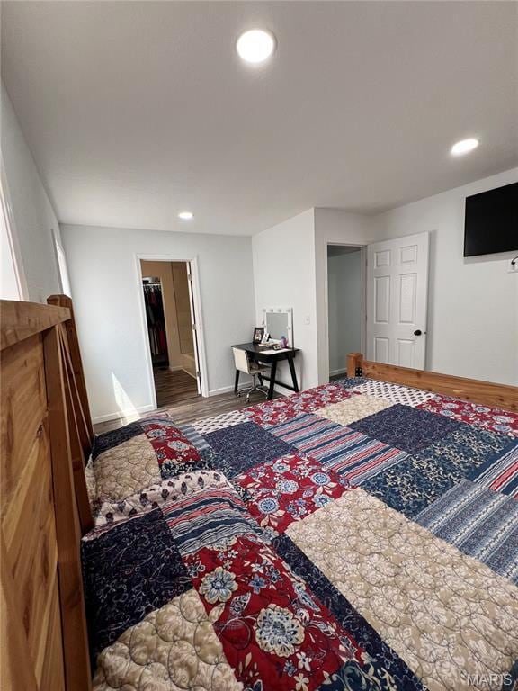 403 E Summit St, Doniphan, MO 63935 - bedroom featuring wood finished floors, recessed lighting, and baseboards