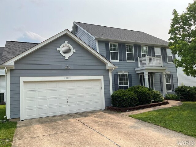 12118 Fahrpark Ln, Saint Louis, MO 63146 - colonial inspired home with driveway, an attached garage, and roof with shingles