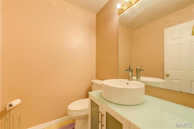 12118 Fahrpark Ln, Saint Louis, MO 63146 - bathroom with toilet, vanity, and tile patterned floors