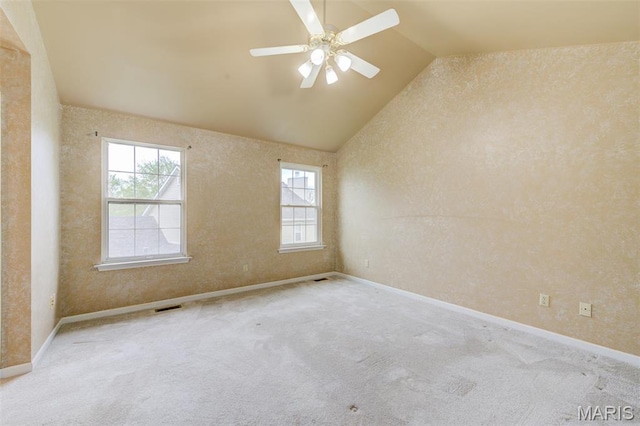 12118 Fahrpark Ln, Saint Louis, MO 63146 - unfurnished room with plenty of natural light, vaulted ceiling, carpet floors, ceiling fan, and baseboards