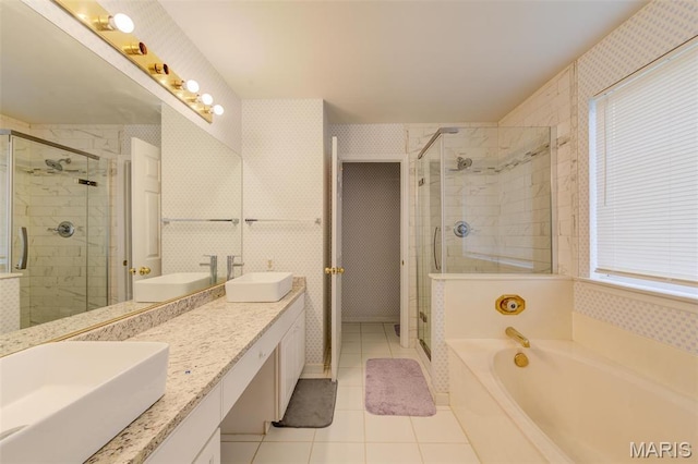 12118 Fahrpark Ln, Saint Louis, MO 63146 - bathroom featuring a bath, tile patterned floors, double vanity, and a shower stall