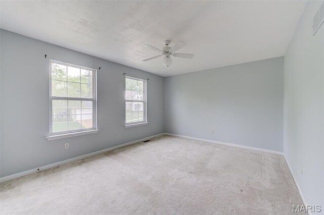 12118 Fahrpark Ln, Saint Louis, MO 63146 - empty room with carpet floors, a ceiling fan, and baseboards