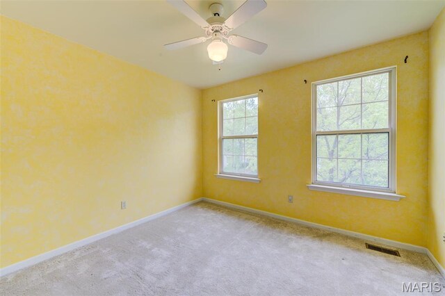 12118 Fahrpark Ln, Saint Louis, MO 63146 - unfurnished room featuring baseboards, carpet, and ceiling fan