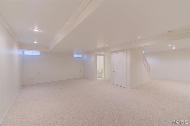 12118 Fahrpark Ln, Saint Louis, MO 63146 - below grade area featuring ornamental molding, light carpet, baseboards, and recessed lighting