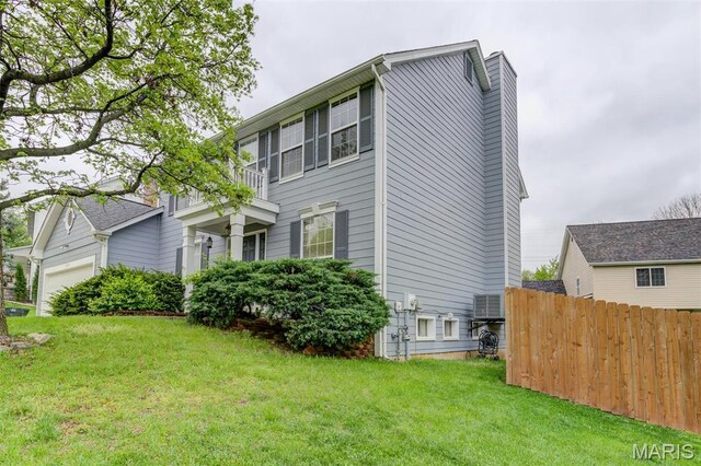 12118 Fahrpark Ln, Saint Louis, MO 63146 - view of property exterior with a chimney