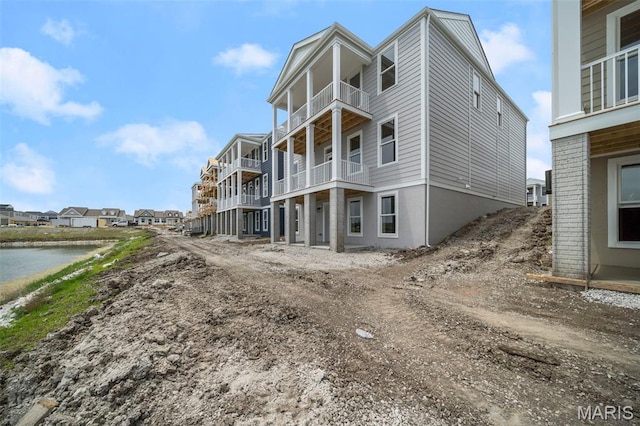3063 Pirogue St, Saint Charles, MO 63301 - view of dirt / gravel road featuring a water view