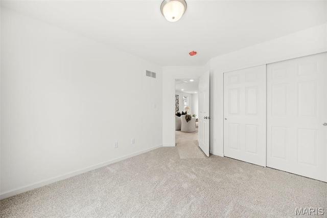 3063 Pirogue St, Saint Charles, MO 63301 - unfurnished bedroom featuring carpet flooring, baseboards, and a closet