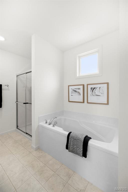 3063 Pirogue St, Saint Charles, MO 63301 - full bath with a garden tub, a stall shower, and tile patterned floors