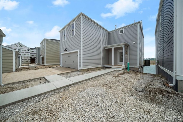 3063 Pirogue St, Saint Charles, MO 63301 - view of front of house featuring a garage and concrete driveway