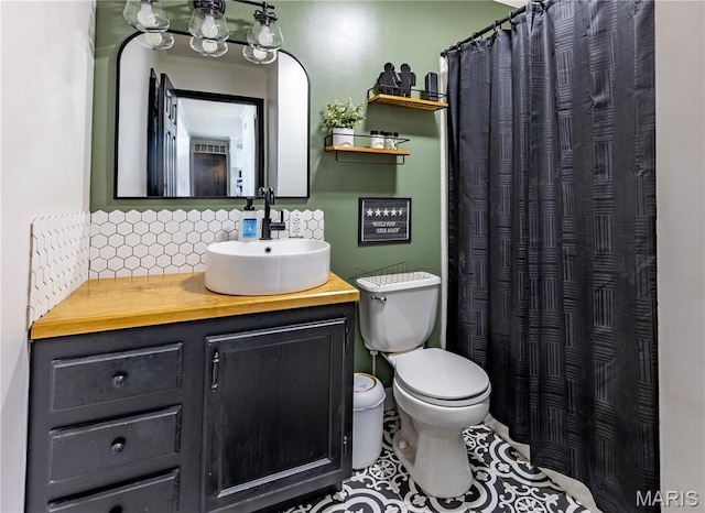 108 Karen St, Sikeston, MO 63801 - full bathroom with toilet, vanity, tasteful backsplash, and a shower with curtain