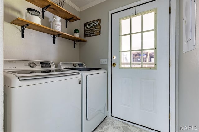 108 Karen St, Sikeston, MO 63801 - laundry room featuring washing machine and clothes dryer and ornamental molding
