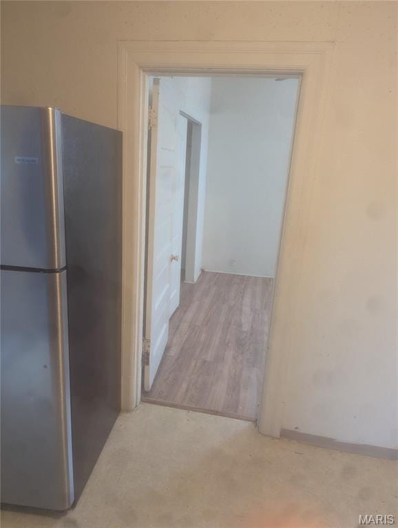5257 Theodosia Ave, Saint Louis, MO 63113 - kitchen with freestanding refrigerator and wood finished floors