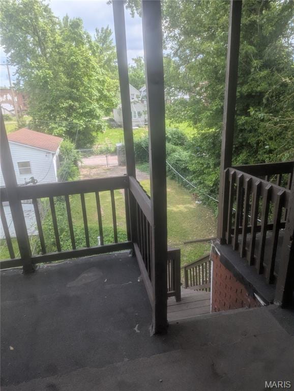 5257 Theodosia Ave, Saint Louis, MO 63113 - wooden terrace featuring a lawn