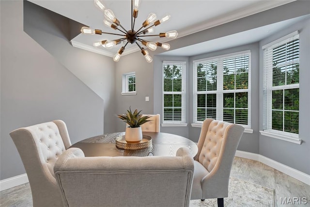 231 W Monroe Ave Unit 205, Saint Louis, MO 63122 - dining area featuring a chandelier, healthy amount of natural light, ornamental molding, and light wood finished floors
