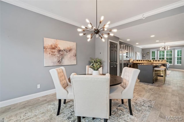 231 W Monroe Ave Unit 205, Saint Louis, MO 63122 - dining area with a chandelier, light wood-type flooring, ornamental molding, and recessed lighting