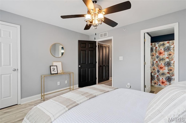 231 W Monroe Ave Unit 205, Saint Louis, MO 63122 - bedroom featuring light wood-type flooring and a ceiling fan