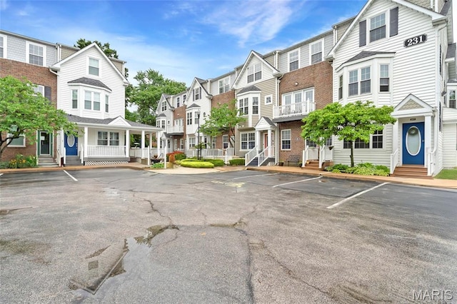 231 W Monroe Ave Unit 205, Saint Louis, MO 63122 - view of property with uncovered parking and a residential view
