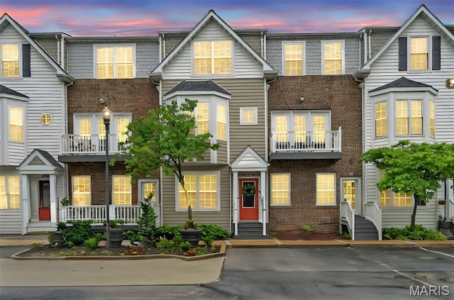 231 W Monroe Ave Unit 205, Saint Louis, MO 63122 - townhome / multi-family property with brick siding and entry steps