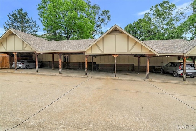 2303 Yosemite Park Ct Unit E, Maryland Heights, MO 63043 - view of front facade with a shingled roof