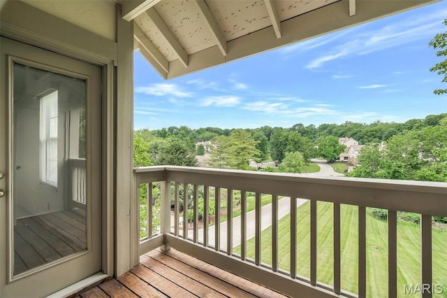 2303 Yosemite Park Ct Unit E, Maryland Heights, MO 63043 - balcony featuring view of wooded area