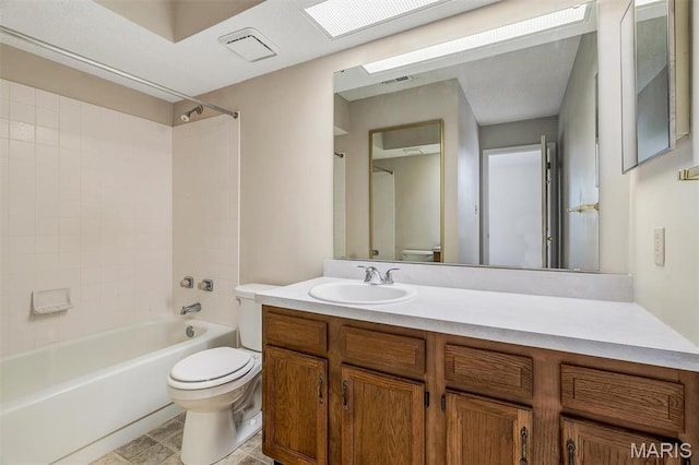 2303 Yosemite Park Ct Unit E, Maryland Heights, MO 63043 - bathroom featuring toilet, shower / tub combination, and vanity