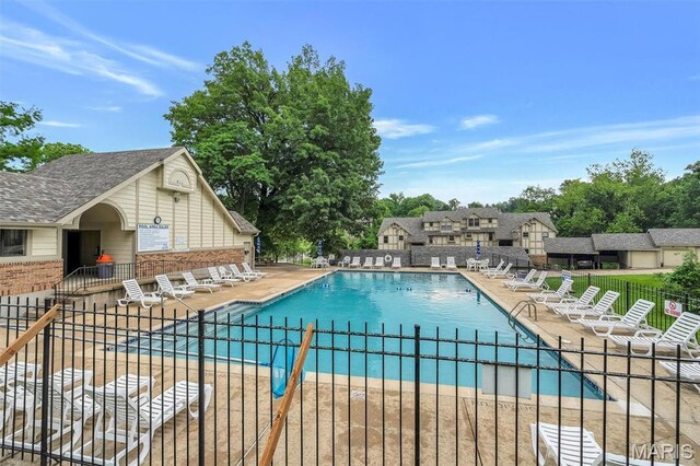 2303 Yosemite Park Ct Unit E, Maryland Heights, MO 63043 - community pool with a patio area