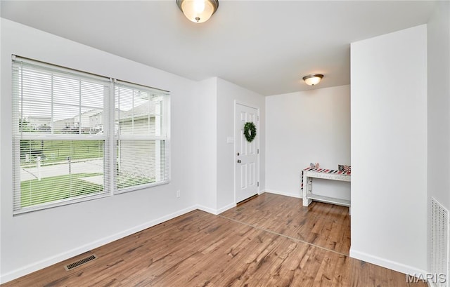 2907 Preston Woods Trl, Lake St Louis, MO 63367 - foyer entrance with wood finished floors and baseboards