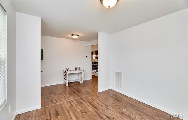 2907 Preston Woods Trl, Lake St Louis, MO 63367 - empty room with wood finished floors and baseboards