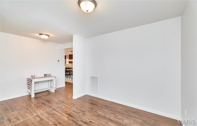 2907 Preston Woods Trl, Lake St Louis, MO 63367 - unfurnished room with wood finished floors and baseboards