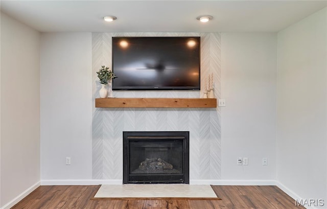 2907 Preston Woods Trl, Lake St Louis, MO 63367 - detailed view of wood finished floors and a fireplace