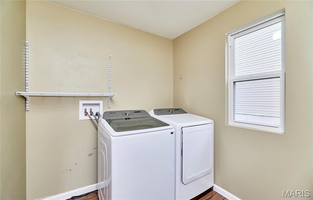 2907 Preston Woods Trl, Lake St Louis, MO 63367 - washroom featuring washing machine and clothes dryer and baseboards