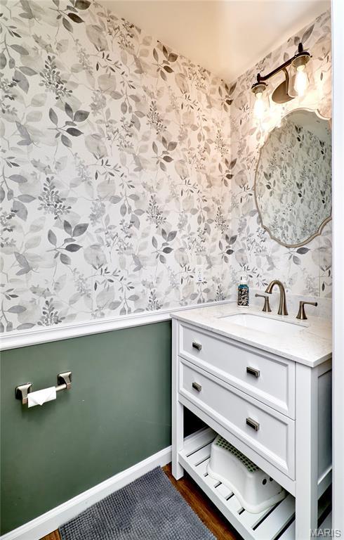 2907 Preston Woods Trl, Lake St Louis, MO 63367 - bathroom with wallpapered walls and vanity