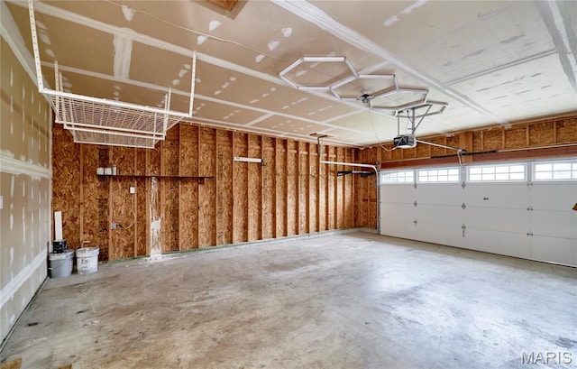 2907 Preston Woods Trl, Lake St Louis, MO 63367 - garage featuring a garage door opener