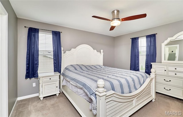 2907 Preston Woods Trl, Lake St Louis, MO 63367 - carpeted bedroom with multiple windows and a ceiling fan