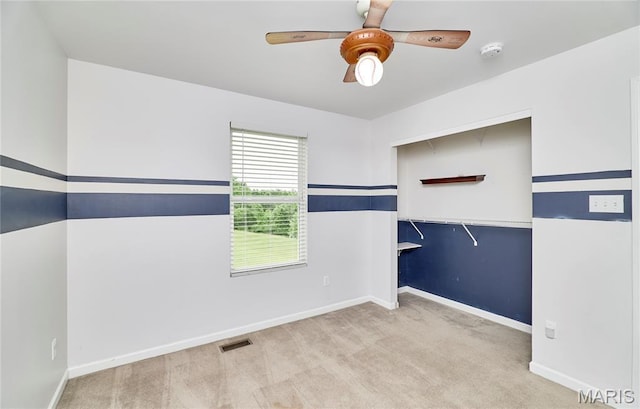 2907 Preston Woods Trl, Lake St Louis, MO 63367 - carpeted spare room with a smoke detector and ceiling fan