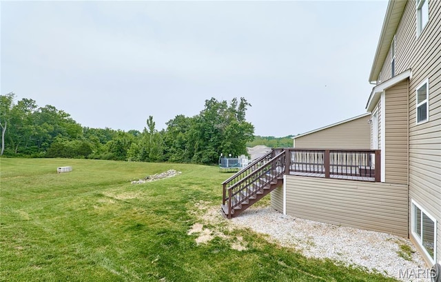 2907 Preston Woods Trl, Lake St Louis, MO 63367 - view of green lawn featuring a deck and stairway