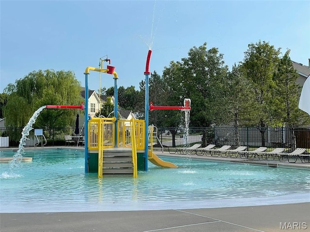 2907 Preston Woods Trl, Lake St Louis, MO 63367 - community play area with a water play area and a community pool