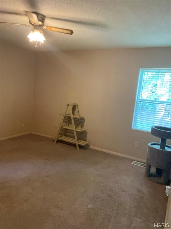 60 La Venta Dr, Florissant, MO 63031 - carpeted spare room with a ceiling fan and baseboards