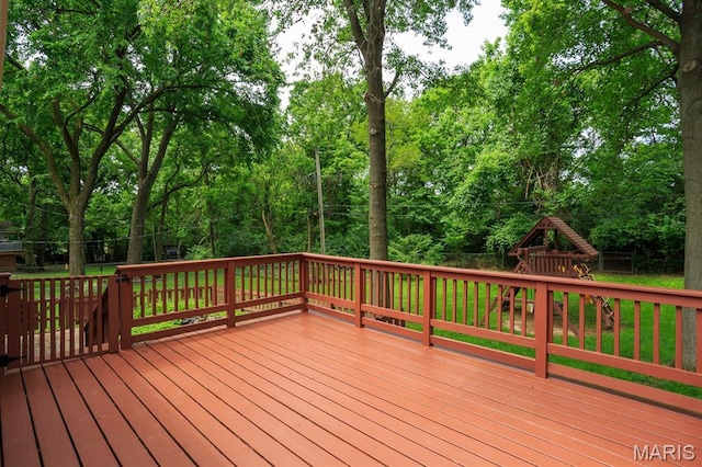 9 Donald Dr, Saint Charles, MO 63304 - wooden terrace featuring a playground and view of scattered trees