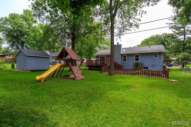 9 Donald Dr, Saint Charles, MO 63304 - view of yard with a playground, an outdoor structure, and a deck