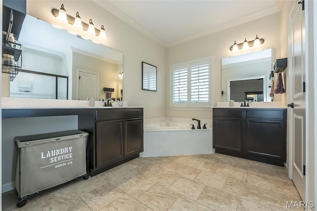 151 Wilmer Valley Dr, Wentzville, MO 63385 - bathroom with ornamental molding, a bath, and two vanities